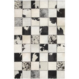 Area Cowhide Patchwork Area Rug in Black/Cream