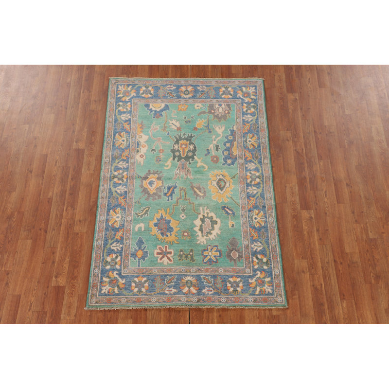 Tapis décoratif turquoise et vert Kazak