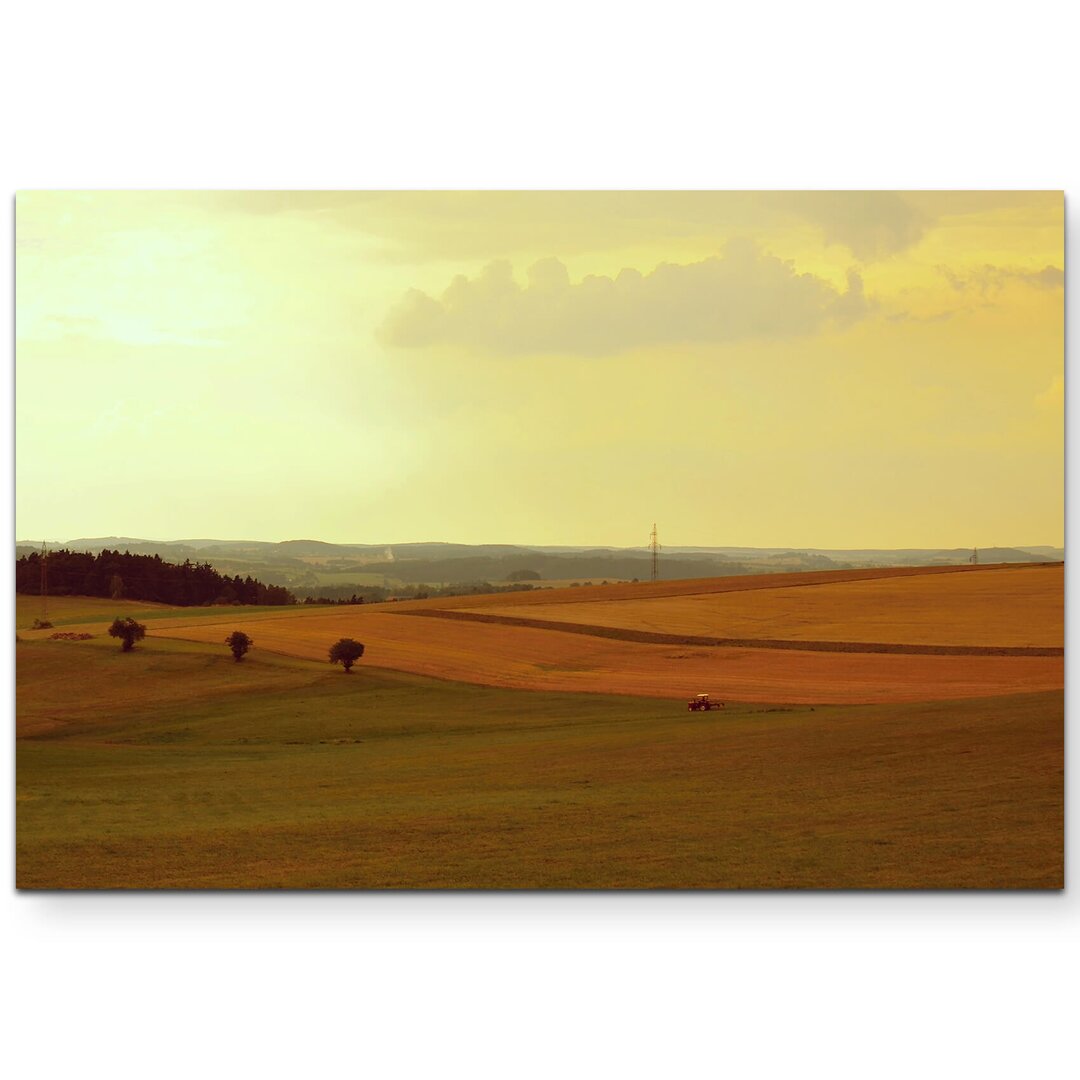 Leinwandbild Feld mit Traktor