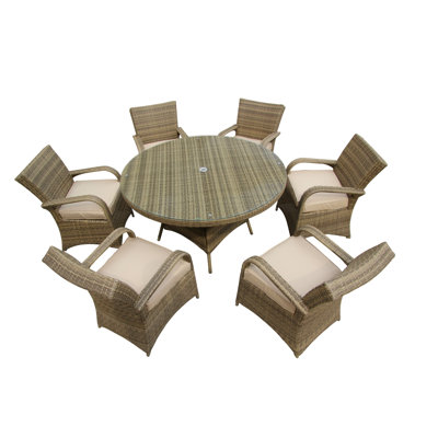 Fairweather 6 - Person Patio Dining Set Round Table with Cushions Included