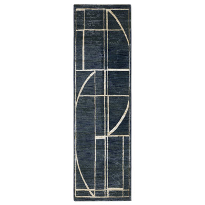 Tapis géométrique rayé bleu / ivoire Rayan