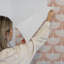 Papier peint «Feather Flock» par Genevieve Gorder-935997910