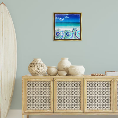 "Three Beach Umbrellas View", art mural encadré flottant par Charlie Carter