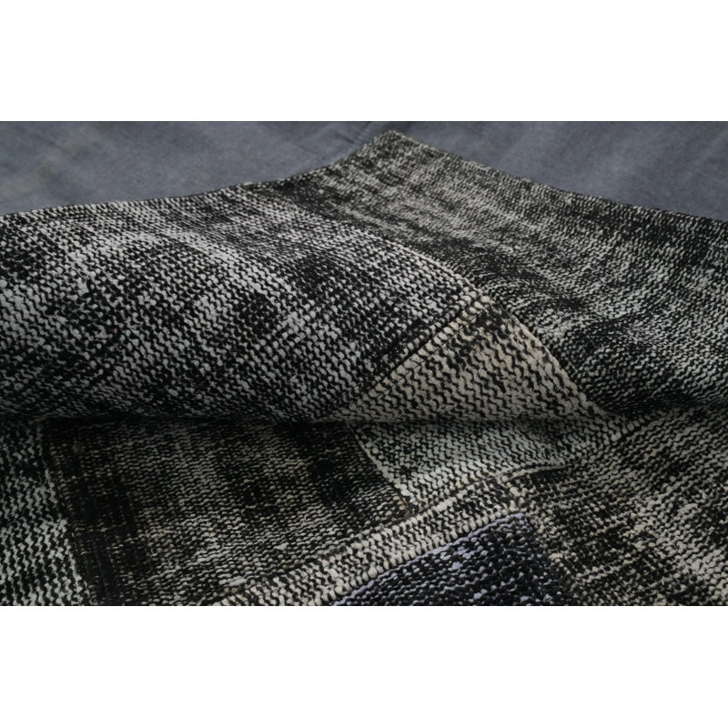 Tapis à motif géométrique patiné 8 x 10