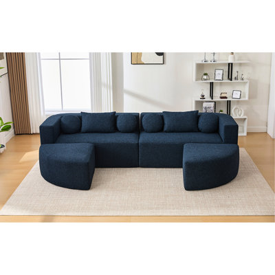 Canapé modulaire Boneless de 114,9 po, combiné avec un siège arrondi aux extrémités arrondies, un siège modulaire de 24,4 po de profondeur et deux coussins traversins, des sièges d'angle et des coussins de profondeur d'assise