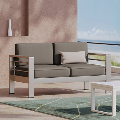Causeuse d'extérieur avec cadre en aluminium et coussins résistants à l'eau pour des sièges de patio durables et confortables