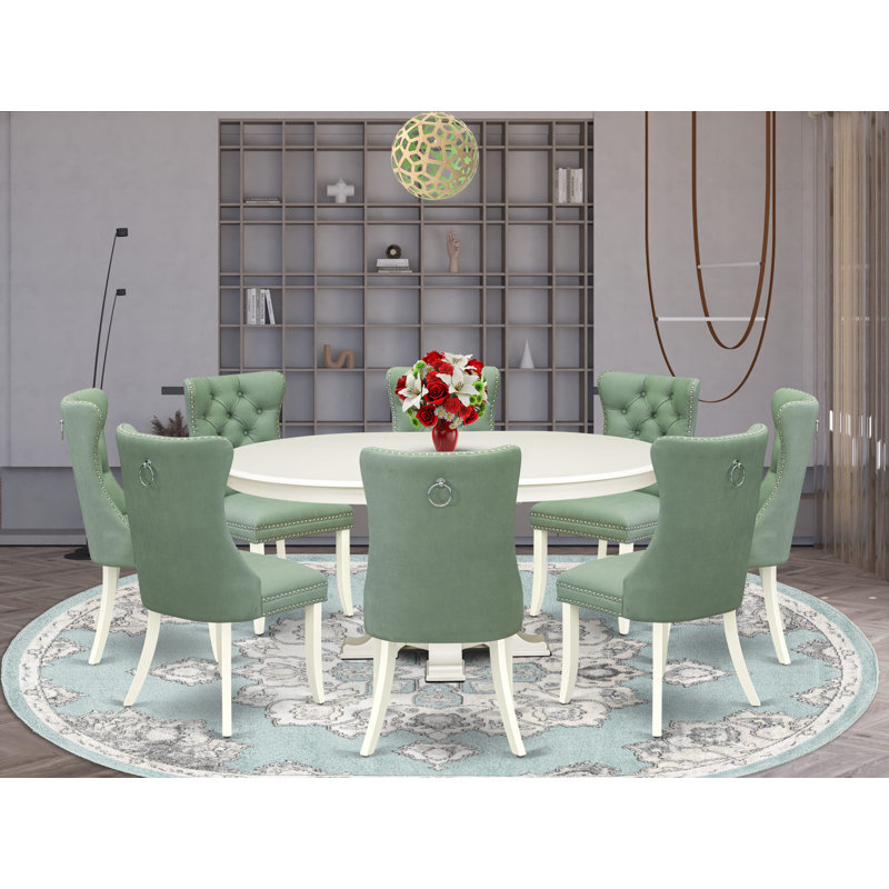 L'ensemble de table de salle à manger 9 pièces se compose d'une table moderne avec un plateau rond et de 8 chaises en polyester gris platine avec capitonnage à boutons, lin blanc