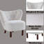 Fauteuil à oreilles blanc avec dossier en mousse confortable et élégant pour plus de confort