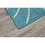 Tapis sarcelle / ivoire touffeté à motif floral Tihiri