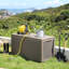 Latitude Run Almasi 120.9cm W 380L Resin Lockable Deck Box in Brown