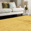 Natonia Shiny Shaggy Gold Area Rug-547240425