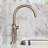 Kingston Brass Hallerbos Two-Handle 4-Hole Deck Mount Bridge Kitchen Faucet with Brass Side Sprayer-101073395