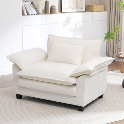 Experience ultimate softness: Our luxurious, oversized, premium-quality chenille half-armchair, complete with decorative cushions
