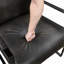 Fauteuil d'appoint rembourré de similicuir gris foncé, structure en métal noir, 1 pièce, confort, durabilité, élégance