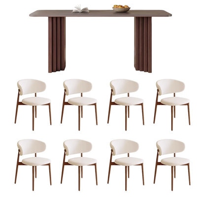 Dining table and chair set with rock slab.
