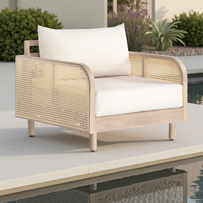 Fauteuil d'extérieur Delavina en eucalyptus naturel et corde avec coussins crème