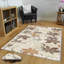 Tapis floral tissé à la machine Medlock en beige / brun clair-1937991878