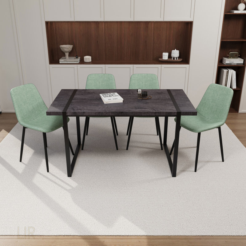 Ensemble de salle à manger moderne 5 pièces avec table en bois aggloméré, base en métal et chaises en suède pour un décor élégant