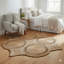 Tapis de jute tissé à la main avec motif rond