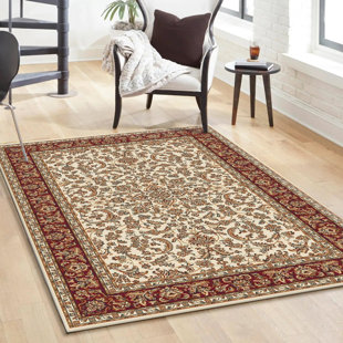 Tapis ivoire à motif floral