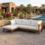 Ensemble modulaire d'extérieur modulaire en bois d'acacia avec coussins épais pour un salon de patio flexible et un confort durable.