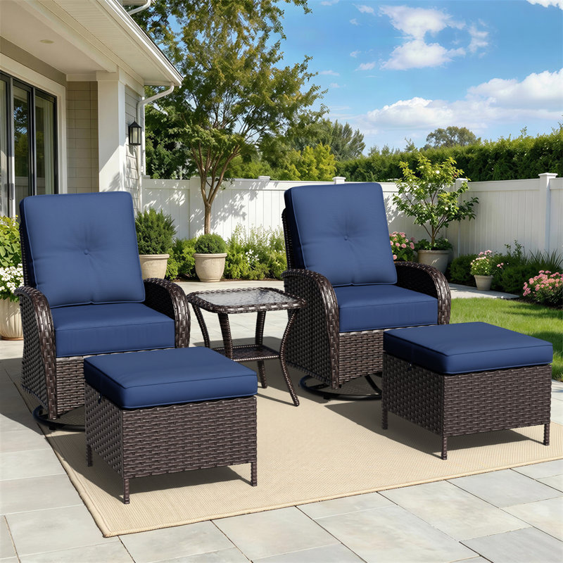 Ensemble de patio pivotant en rotin 5 pièces avec table d'appoint et repose-pieds de rangement Holoman, fauteuils inclinables en osier avec coussins