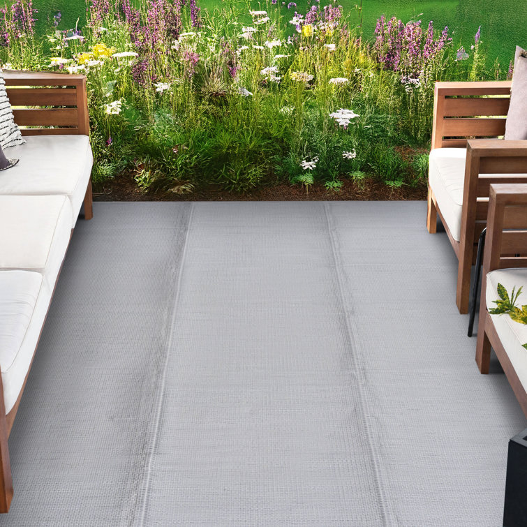 Tapis contemporain gris en polypropylène Kristofer