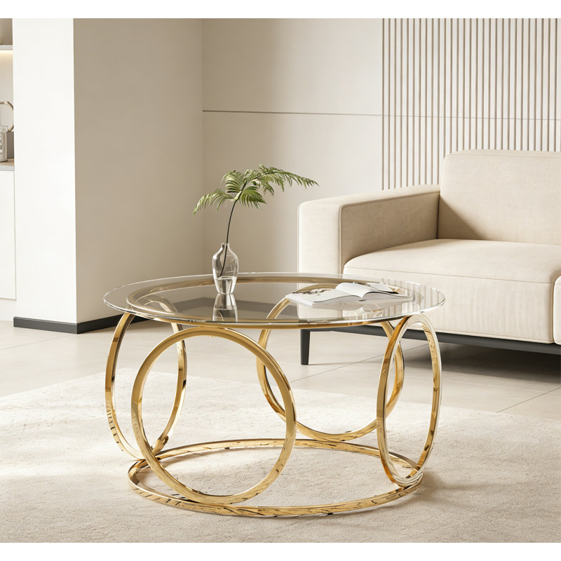 Table basse 31,5 "moderne avec plateau rond en verre et structure circulaire en métal, Doré