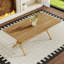 Table de salle à manger moderne et minimaliste avec plateau d'épissure et support en forme de X-126537927