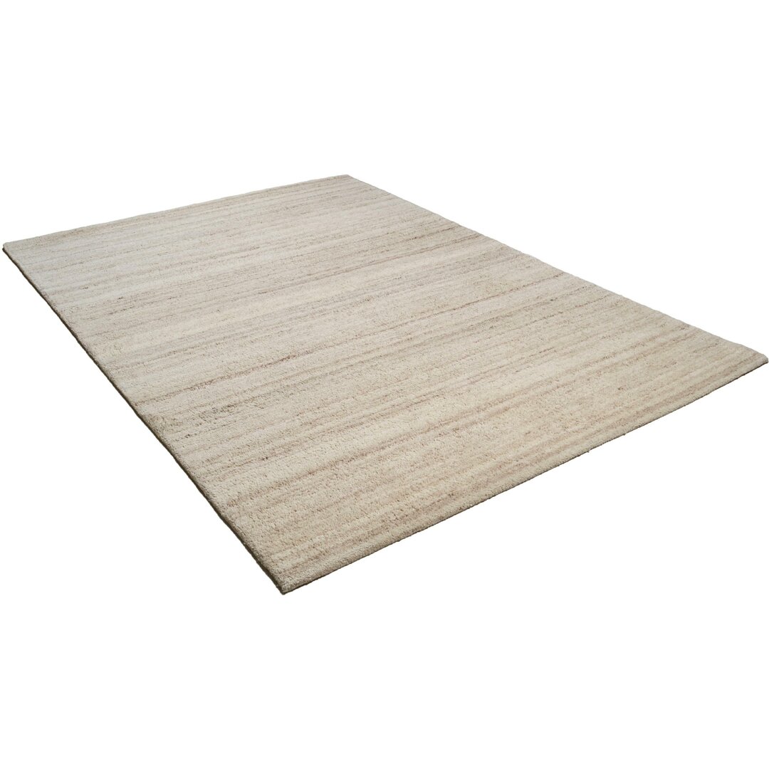 Handgefertigter Teppich Brigden aus Wolle in Beige