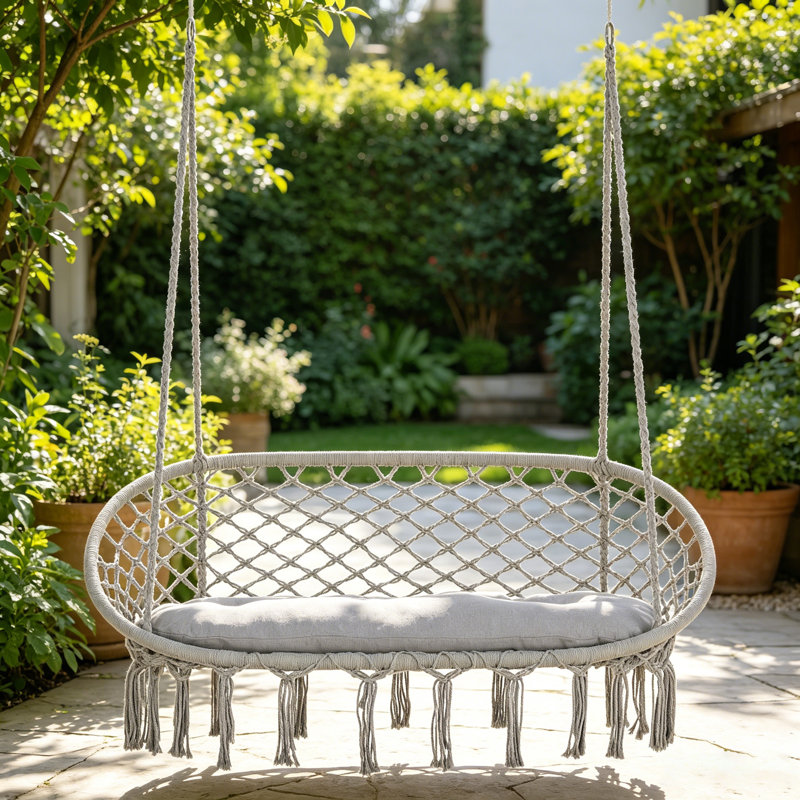 Chaise hamac pour 2 personnes avec balançoire en macramé, coussin moelleux et corde de coton suspendue pour une détente confortable en plein air