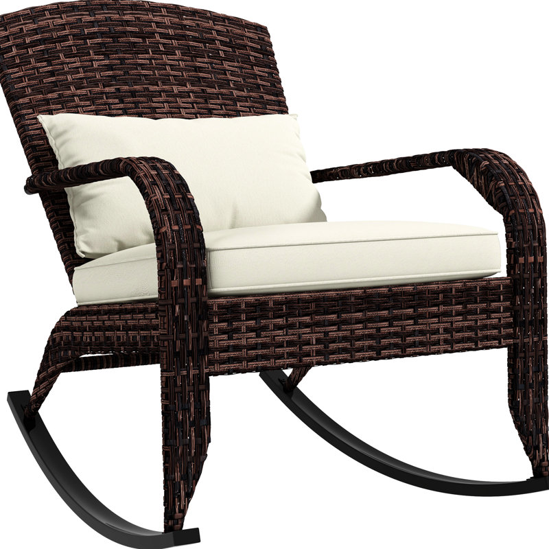 Fauteuil à bascule blanc crème pour balcon, avec dossier haut, coussin d'assise confortable et oreiller, idéal pour se détendre sur une terrasse, dans un jardin ou sur un porche.