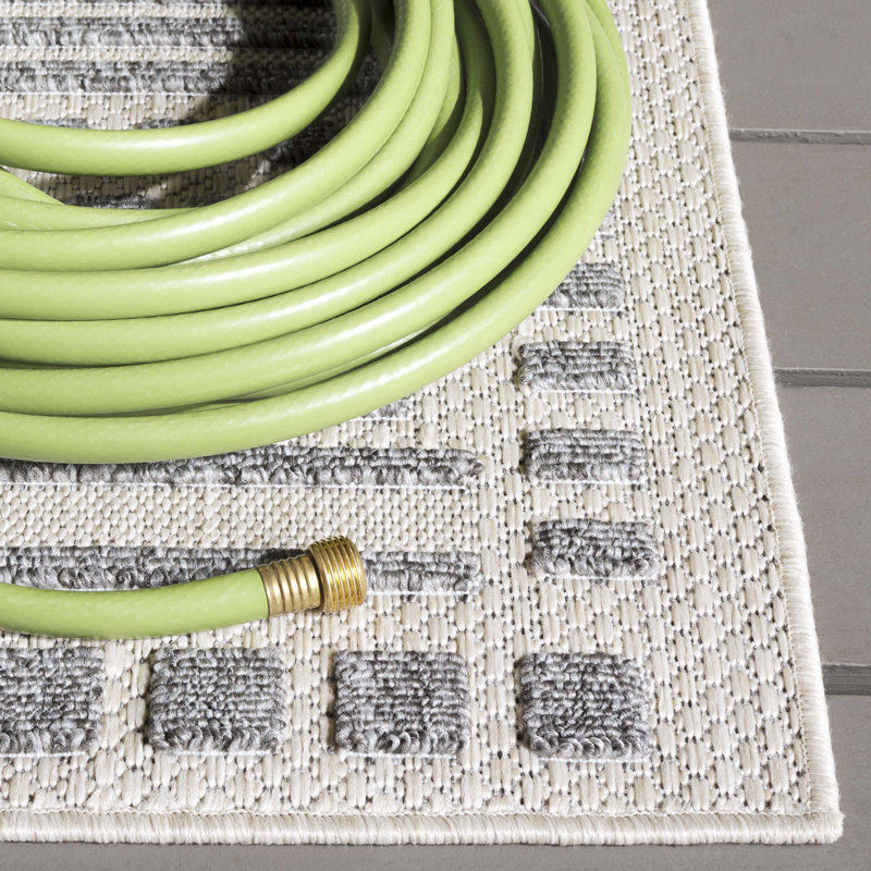 Gray and Beige Geometric 8' x 10' Synthetic Area Rug