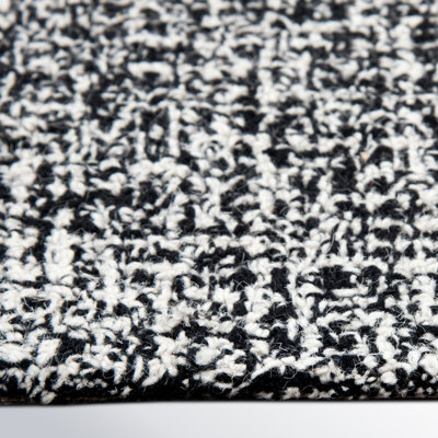 Tapis noir / blanc en laine touffeté à la main Britley
