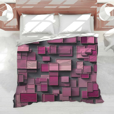 Édredon à motif géométrique rose