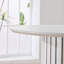 Table de salle à manger ronde en MDF blanc doux pour 4 personnes, style minimaliste moderne avec base en tréteaux