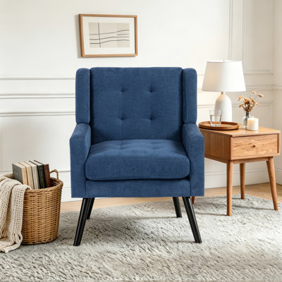 Fauteuil capitonné à dossier large rembourré