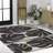 Colgin Classic Beach Stripe and Monstera Leaf Black/Beige Indoor/Outdoor Rug-741757537