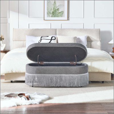 Oval Upholstered Storage Ottoman With Fringe Trim & Lift-Top Lid, Multi-Functional Footrest & Hidden Storage For Living Room Or Bedroom - Fabric With Metal Frame