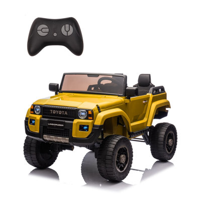 Voiture à 2 places sous licence 24V pour enfants avec télécommande, interrupteur à 4 roues motrices / 2 roues motrices, lumières DEL, Bluetooth et pelle, certifié ASTM / CPSIA pour les enfants de plus de 3 ans, maximum 110 lb, jaune