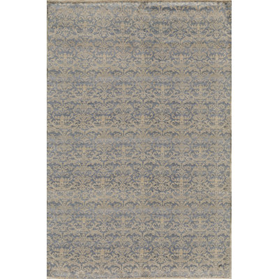 Tapis bleu et doré de haute qualité noué à la main