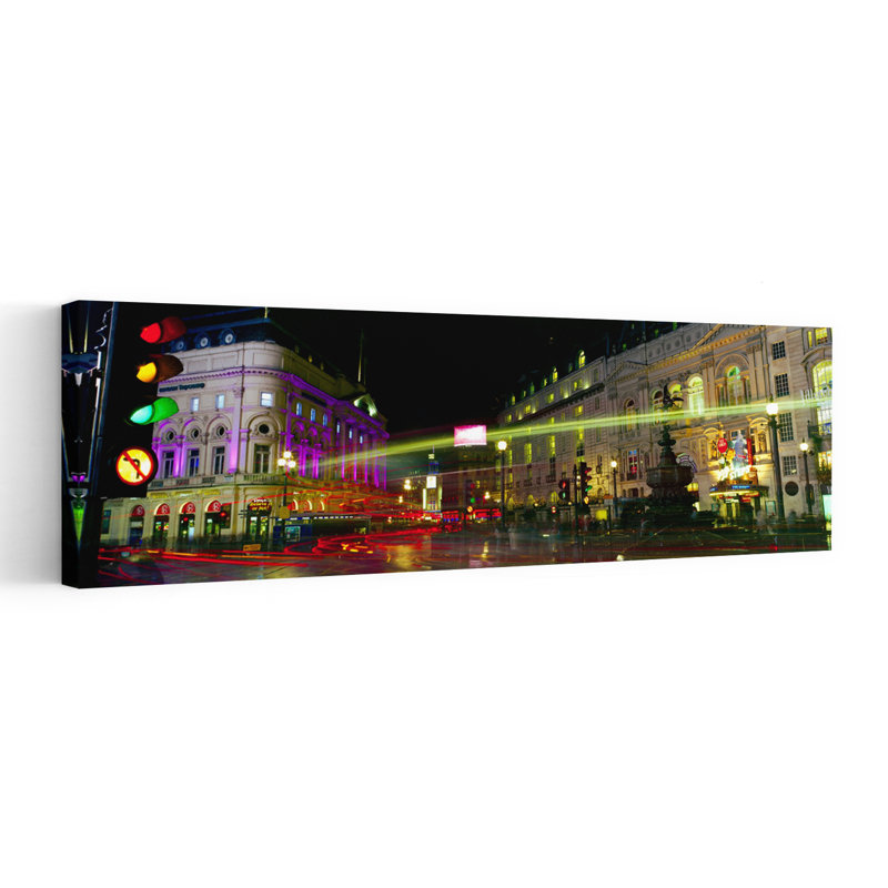Buildings Lit Up At Night Piccadilly Circus London England by Pietro Canali - Wrapped Canvas Panoramic Print