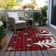 Machine Washable Indoor/Outdoor Christmas Reindeer Xhevrie Red Rug