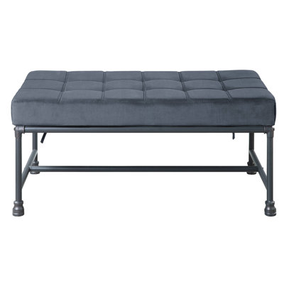 Banc de chambre en velours gris avec pieds industriels et design industriel capitonné pour