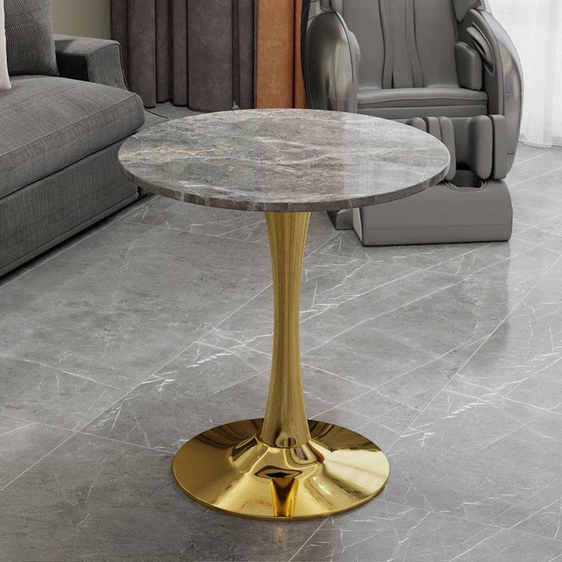 Cette table basse de 27,6 pouces de style Mid-Century de style moderne Mid-Century peut accueillir de 2 à 4 personnes et comprend un plateau de table rond en marbre texturé gris foncé, convenant à divers espaces.
