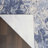 Corpuz Abstract Blue/Cream Area Rug-326925419