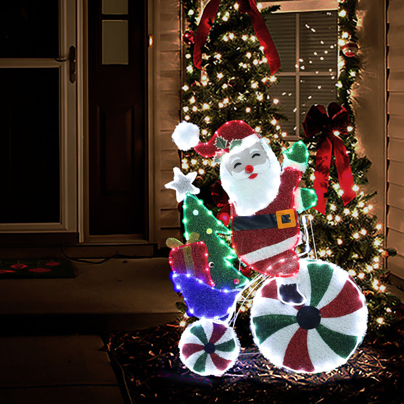 The Holiday Aisle® Santa on Peppermint Bike Lighted Display