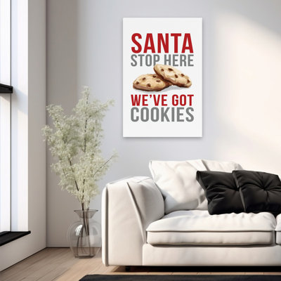 «Santa Stop Here» - Père Noël contemporain signant des biscuits pour le Père Noël
