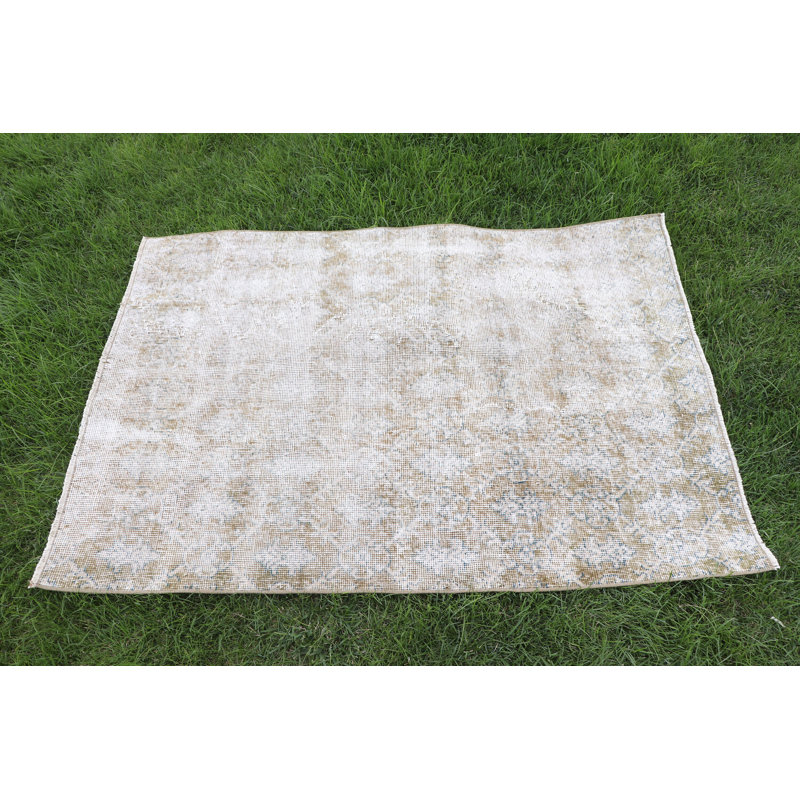 Unique Vintage Turkish Door Mat with Distressed Earthy Tones Rug Design for Home Decor