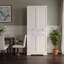 Armoire de rangement blanche avec portes et tablettes, idéale pour la cuisine et la salle de bain.